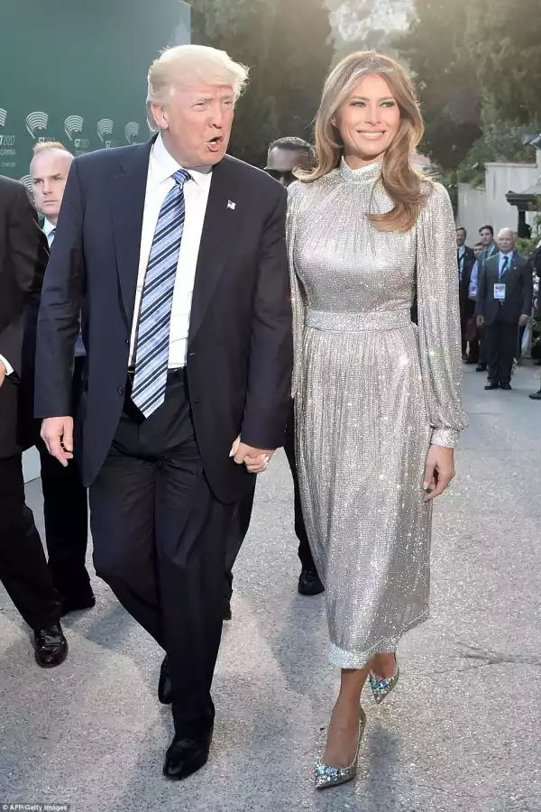 Melania Trump Holds Her Husband